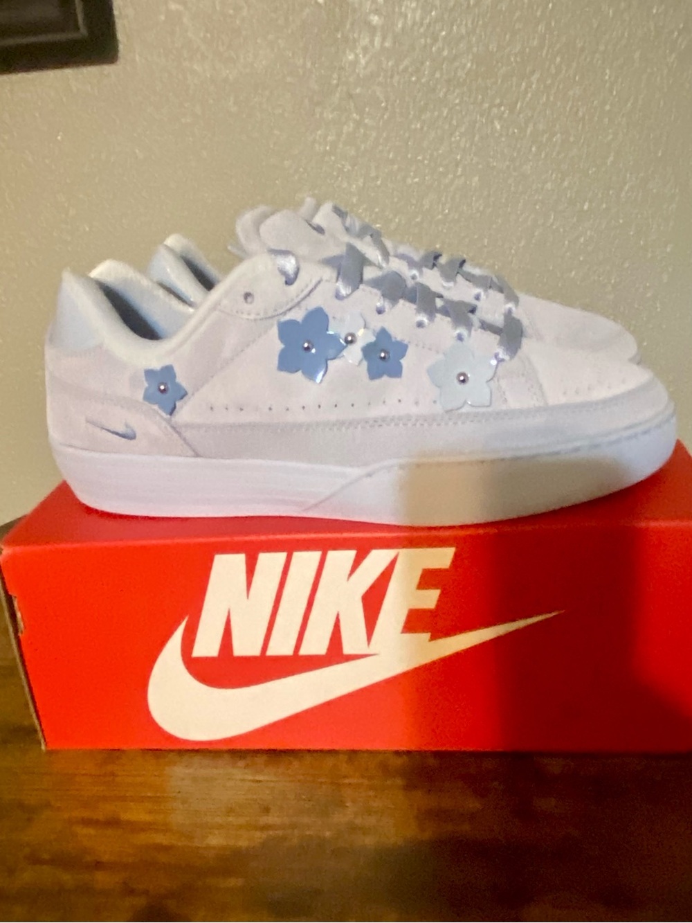 Nike Light Blue Low-Top Sneakers with Light Blue Flower Accents